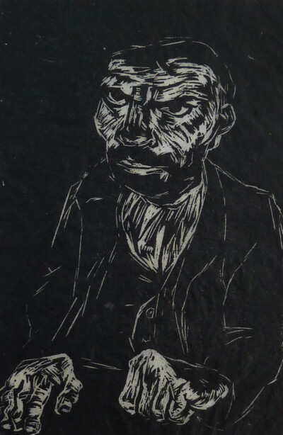 Portrait of a Man with Hands on Table